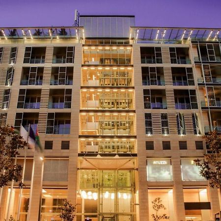 The Abdali Boulevard Hotel Amã Exterior foto The hotel at night