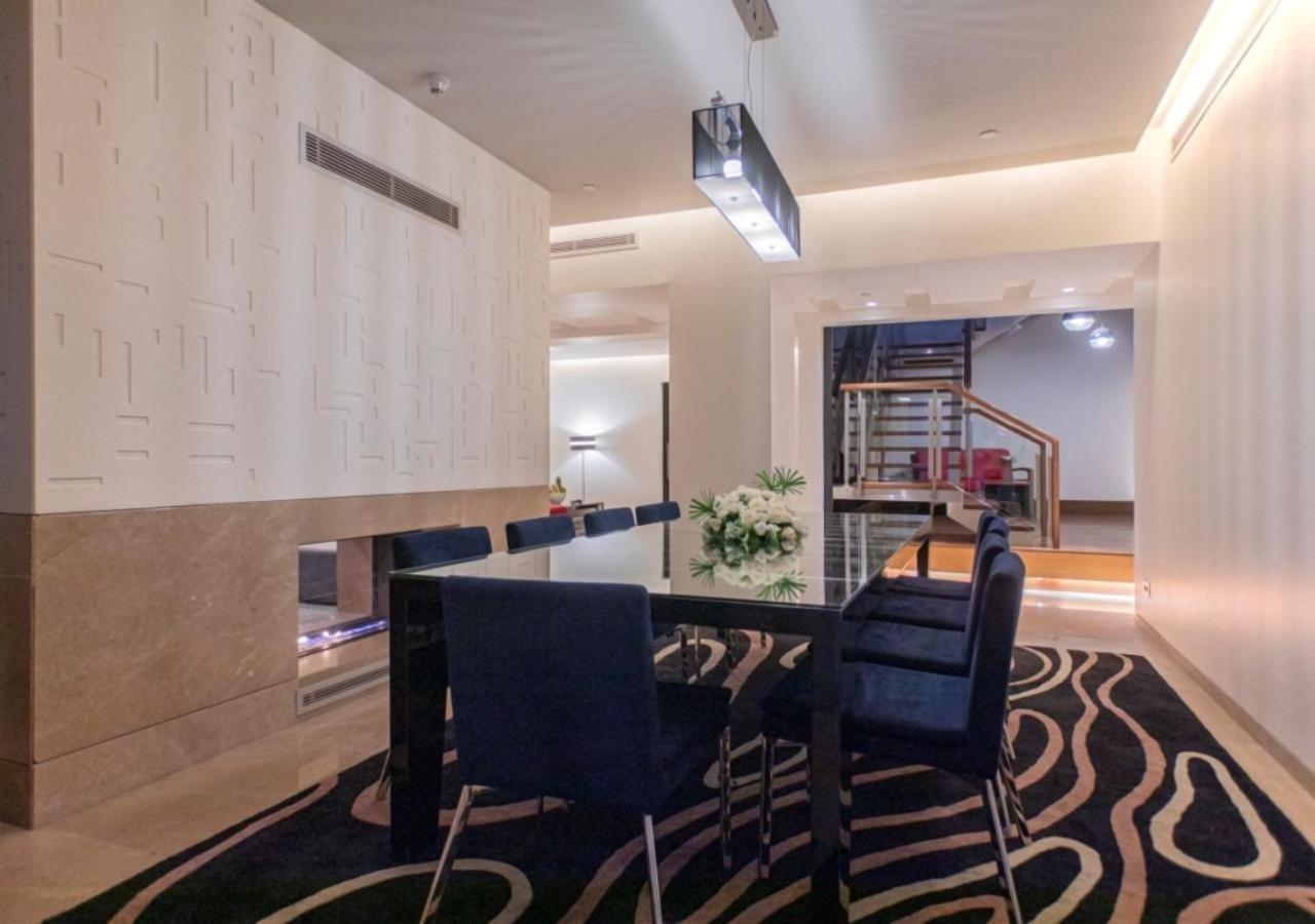 The Abdali Boulevard Hotel Amã Exterior foto A modern dining room